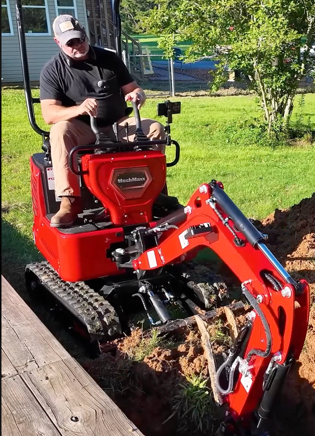 mini excavator being used for landscaping