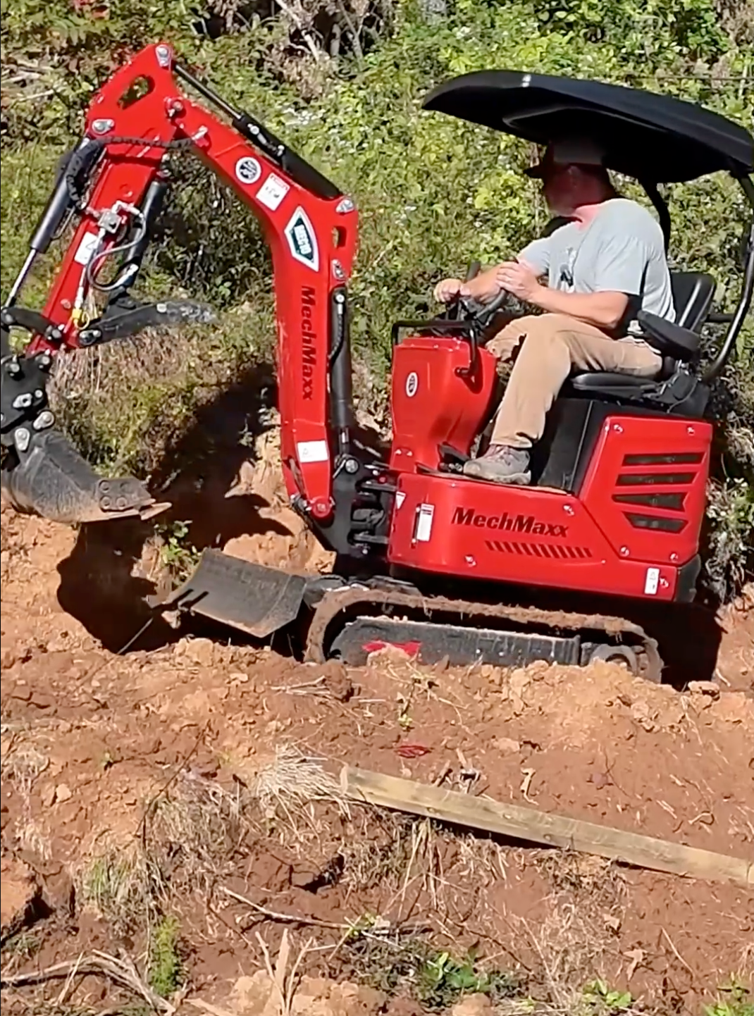 mini excavator being used for trenching