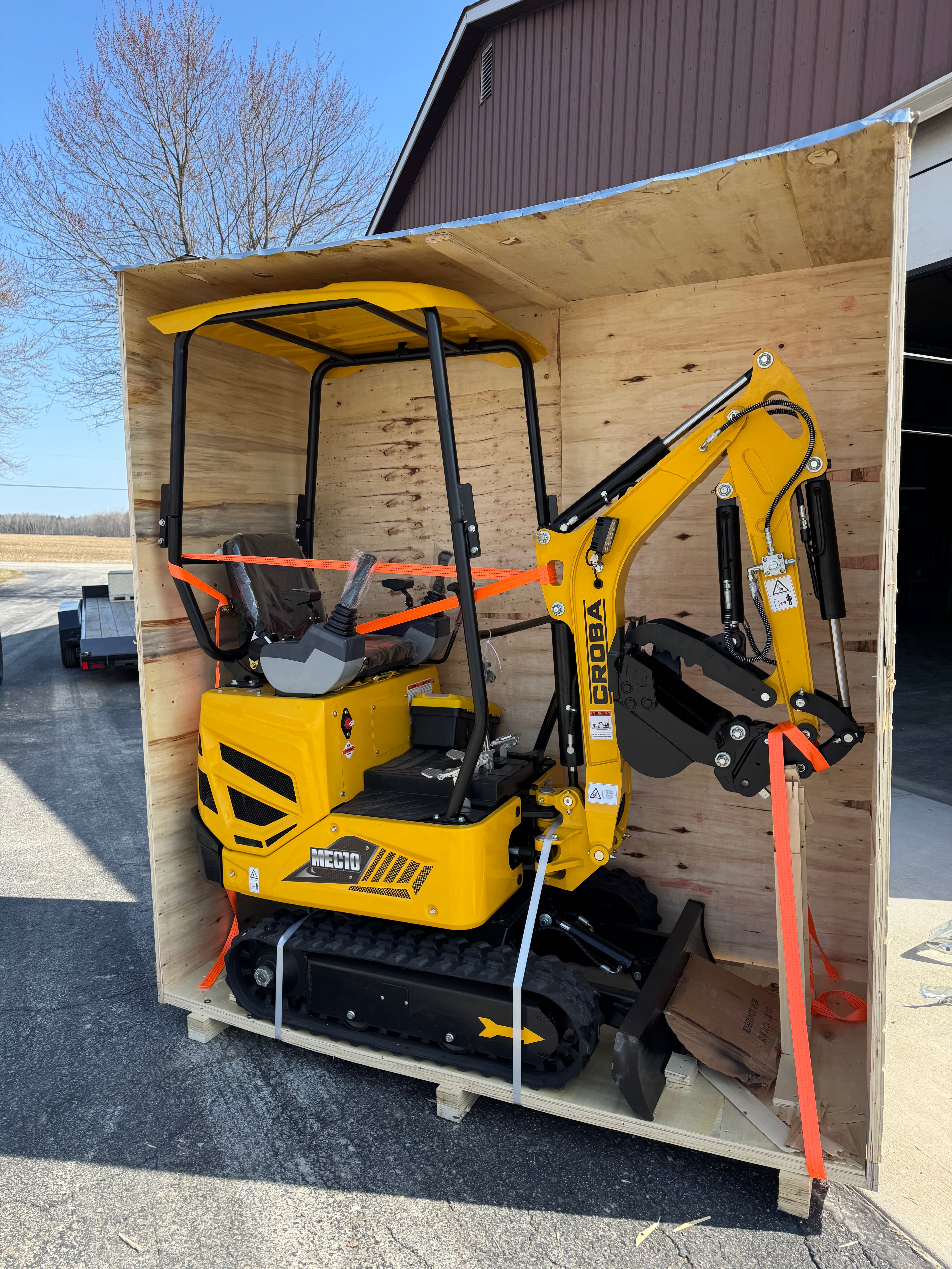 mini excavator being used for delivery